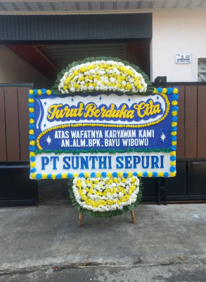 Papan Bunga Duka di Bello