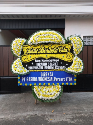 Papan Bunga Duka di Bello